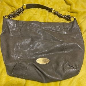 Dana Buchman leather purse, gray with no visible damage noted.  Hardly used.